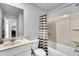 Clean, well-lit bathroom featuring a vanity, toilet, and shower with a bathtub, with fresh white tiling at 157 Tuscan Sun St, Summerville, SC 29485