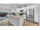 Modern kitchen featuring stainless steel appliances, granite countertops, and a center island at 157 Tuscan Sun St, Summerville, SC 29485