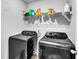 Laundry room with modern washer and dryer, offering convenience and functionality at 157 Tuscan Sun St, Summerville, SC 29485
