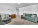 Inviting living room with a comfortable seating arrangement, perfect for relaxing and entertaining at 157 Tuscan Sun St, Summerville, SC 29485
