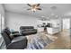 Open concept living room and kitchen with hardwood flooring at 157 Tuscan Sun St, Summerville, SC 29485