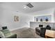 Bright loft area featuring cozy seating, ideal for a home office or entertainment space at 157 Tuscan Sun St, Summerville, SC 29485