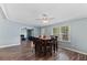 Open dining area with view into living room features wood floors and natural light at 158 Dean Dr, Summerville, SC 29483