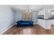 Bright living room with wood floors, a view of the front yard, and an open floor plan at 158 Dean Dr, Summerville, SC 29483