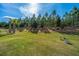 Spacious backyard with lush green grass, perfect for outdoor activities and enjoying the natural surroundings at 159 Garden Gate Way, Summerville, SC 29486
