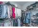 Walk-in closet featuring wire shelving holding lots of personal clothes and shoes at 159 Garden Gate Way, Summerville, SC 29486