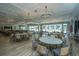 Spacious dining area with ample seating, perfect for community events and gatherings with elegant lighting at 159 Garden Gate Way, Summerville, SC 29486