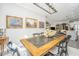 Elegant dining room featuring a wooden table, chandelier lighting, and decorative wall art at 159 Garden Gate Way, Summerville, SC 29486