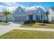Charming single-story home with a well-maintained lawn, two-car garage, and inviting curb appeal at 159 Garden Gate Way, Summerville, SC 29486