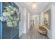 Elegant foyer with stylish decor, hardwood floors, and a welcoming atmosphere leading into the home at 159 Garden Gate Way, Summerville, SC 29486