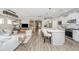 Bright, open-concept living space features a gourmet kitchen with a large island and seamless flow to the living area at 159 Garden Gate Way, Summerville, SC 29486