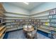Community library area featuring ample shelving and reading table at 159 Garden Gate Way, Summerville, SC 29486