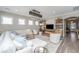 Cozy living room featuring comfortable seating, stylish decor, and plenty of natural light for a relaxing ambiance at 159 Garden Gate Way, Summerville, SC 29486