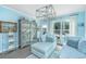 Inviting living area with stylish furniture, a decorative cabinet, and serene outdoor views at 159 Garden Gate Way, Summerville, SC 29486