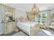 Charming bedroom featuring ornate furniture, a decorative chandelier, and soft natural lighting at 159 Garden Gate Way, Summerville, SC 29486