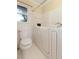 Bathroom featuring a white toilet and soaking tub at 1636 Pinopolis Rd, Moncks Corner, SC 29461
