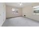 Bedroom showcasing neutral walls, carpet flooring, and natural light at 1636 Pinopolis Rd, Moncks Corner, SC 29461