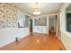 Open dining room showcasing hardwood floors and a view of other living areas in the home at 1636 Pinopolis Rd, Moncks Corner, SC 29461