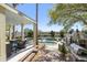 Backyard with a covered patio, pool, and waterfront views at 1644 Omni Blvd, Mount Pleasant, SC 29466
