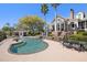 Stunning backyard pool with cascading waterfall and ample space for outdoor entertaining at 1644 Omni Blvd, Mount Pleasant, SC 29466