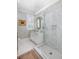 Bright bathroom boasting marble walk-in shower and beautiful wallpaper at 1644 Omni Blvd, Mount Pleasant, SC 29466