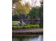 Picturesque outdoor fountain with manicured landscaping and serene waterfront view at 1644 Omni Blvd, Mount Pleasant, SC 29466