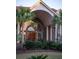 Close-up of the front entrance featuring arched windows and double wooden doors at 1644 Omni Blvd, Mount Pleasant, SC 29466