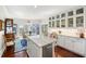 Eat-in kitchen featuring a marble island and stainless steel appliances at 1644 Omni Blvd, Mount Pleasant, SC 29466
