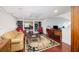 Inviting living room with hardwood floors, a comfortable sofa, and a view into another room at 1644 Omni Blvd, Mount Pleasant, SC 29466