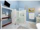 Bathroom showcasing a glass shower, artwork, and marble flooring at 1644 Omni Blvd, Mount Pleasant, SC 29466