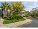 Multi-Gathering building featuring mature landscaping, green and beige siding, and ample parking at 1755 Central Park Rd # 3102, Charleston, SC 29412