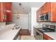 Kitchen featuring stainless steel appliances, cherry cabinets, and ample counter space at 1755 Central Park Rd # 3102, Charleston, SC 29412