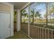 Relaxing screened patio with tranquil views of trees and greenery, offering a serene outdoor escape at 1755 Central Park Rd # 3102, Charleston, SC 29412
