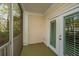 Inviting patio with double doors, offering a seamless transition between indoor and outdoor living at 1755 Central Park Rd # 3102, Charleston, SC 29412