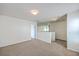 Open loft area with plush carpet and plenty of space, perfect for relaxing or entertaining at 189 Weeping Cypress Dr, Moncks Corner, SC 29461