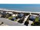 Aerial view of a lovely beach house and beach access in a coastal community at 1908 Palmetto Boulevard Blvd, Edisto Island, SC 29438