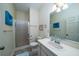 Bright bathroom with a framed shower, vanity with white countertops, and tile flooring at 1908 Palmetto Boulevard Blvd, Edisto Island, SC 29438