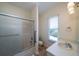 This bathroom has a shower, toilet, sink, and window at 1908 Palmetto Boulevard Blvd, Edisto Island, SC 29438