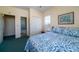 This bedroom features an ensuite bathroom and closet at 1908 Palmetto Boulevard Blvd, Edisto Island, SC 29438