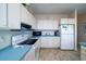 Efficient kitchen with full-sized appliances and ample storage, perfect for cooking enthusiasts at 1908 Palmetto Boulevard Blvd, Edisto Island, SC 29438