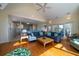 Bright living room with open concept, hardwood floors, and access to dining and ocean views at 1908 Palmetto Boulevard Blvd, Edisto Island, SC 29438