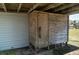 An outdoor shower stall sits on the side of the house at 1908 Palmetto Boulevard Blvd, Edisto Island, SC 29438