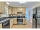 Functional kitchen with stainless steel appliances and wood flooring at 1932 Sunnyvale Ave, Charleston, SC 29414