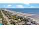 Desirable coastal real estate with luxury homes lining the beach, providing an idyllic seaside living experience at 212 Ocean Blvd, Isle of Palms, SC 29451