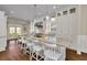 Bright, spacious kitchen with stainless steel appliances, ample cabinet space, and a large island at 212 Ocean Blvd, Isle of Palms, SC 29451