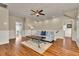 Inviting living room featuring hardwood floors, a comfortable sofa, and stylish decor at 212 Ocean Blvd, Isle of Palms, SC 29451