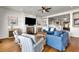 Bright living room featuring fireplace and staircase at 212 Ocean Blvd, Isle of Palms, SC 29451