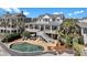 Stunning home with a private pool, multiple decks, and lush landscaping at 212 Ocean Blvd, Isle of Palms, SC 29451