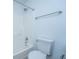 Clean bathroom with a white toilet, a shower and tub combo, a shower head and towel bars at 218 Candleberry Cir, Goose Creek, SC 29445