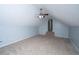 Carpeted bedroom with gray walls, ceiling fan, window and access to stairs at 218 Candleberry Cir, Goose Creek, SC 29445